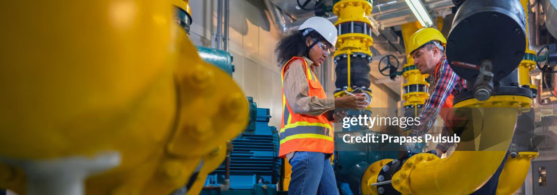 Technician engineer working in industrial plant